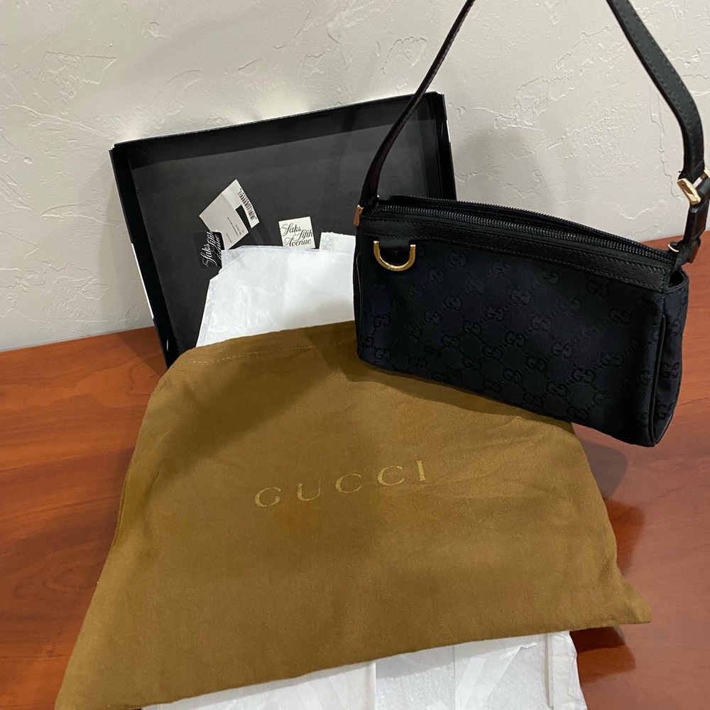 Like New Authentic Gucci GG Canvas with leather trim small shoulder bag